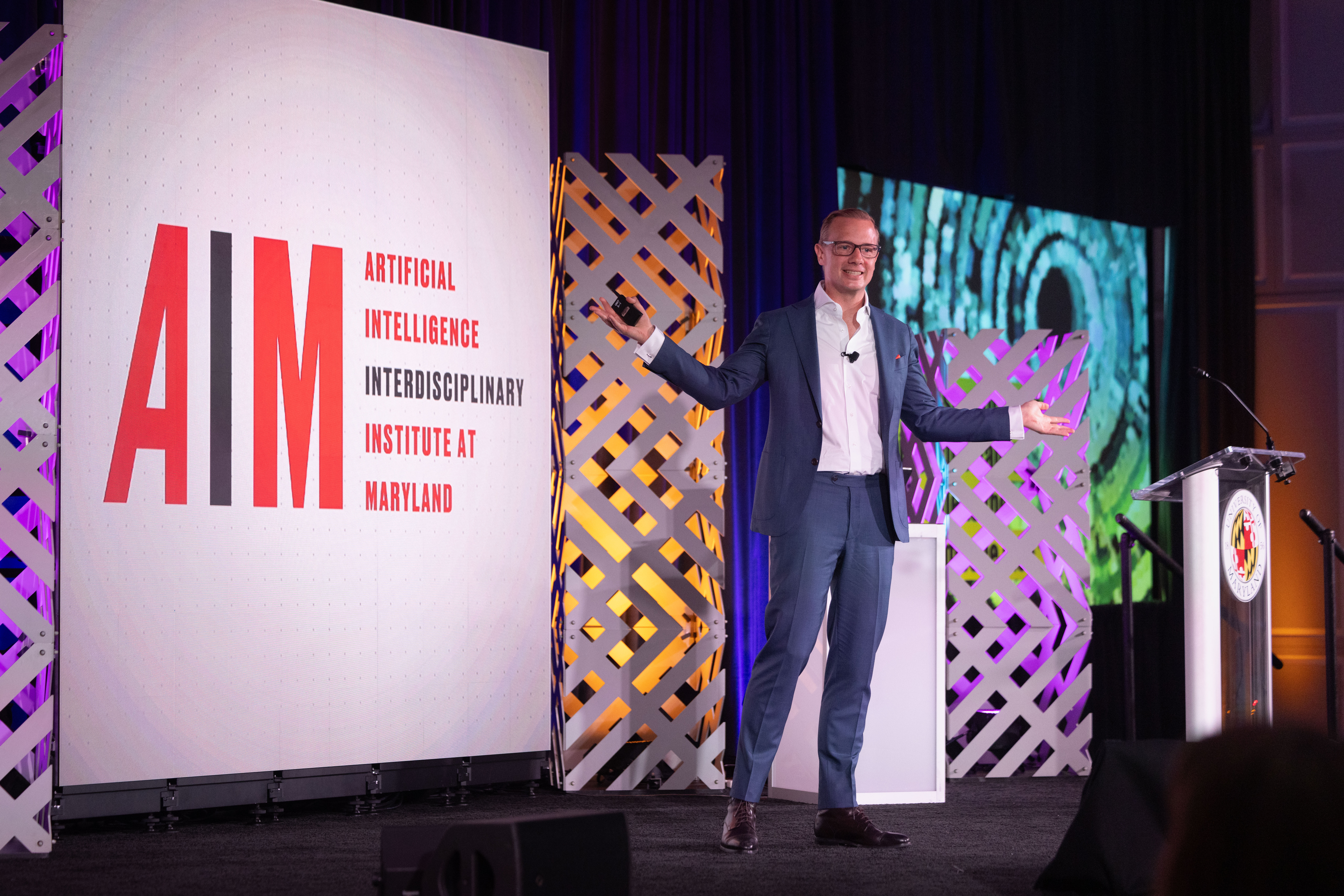 Director Hal Daume III giving a speech at the AIM opening ceremony.
